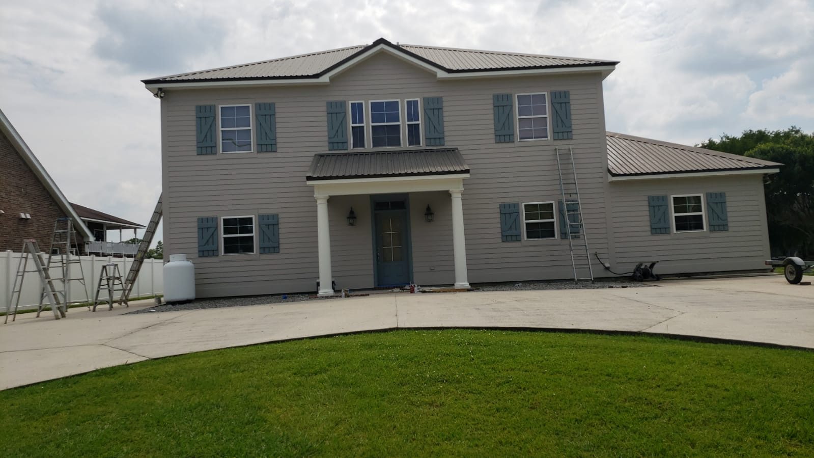 Large two-story home — exterior finish