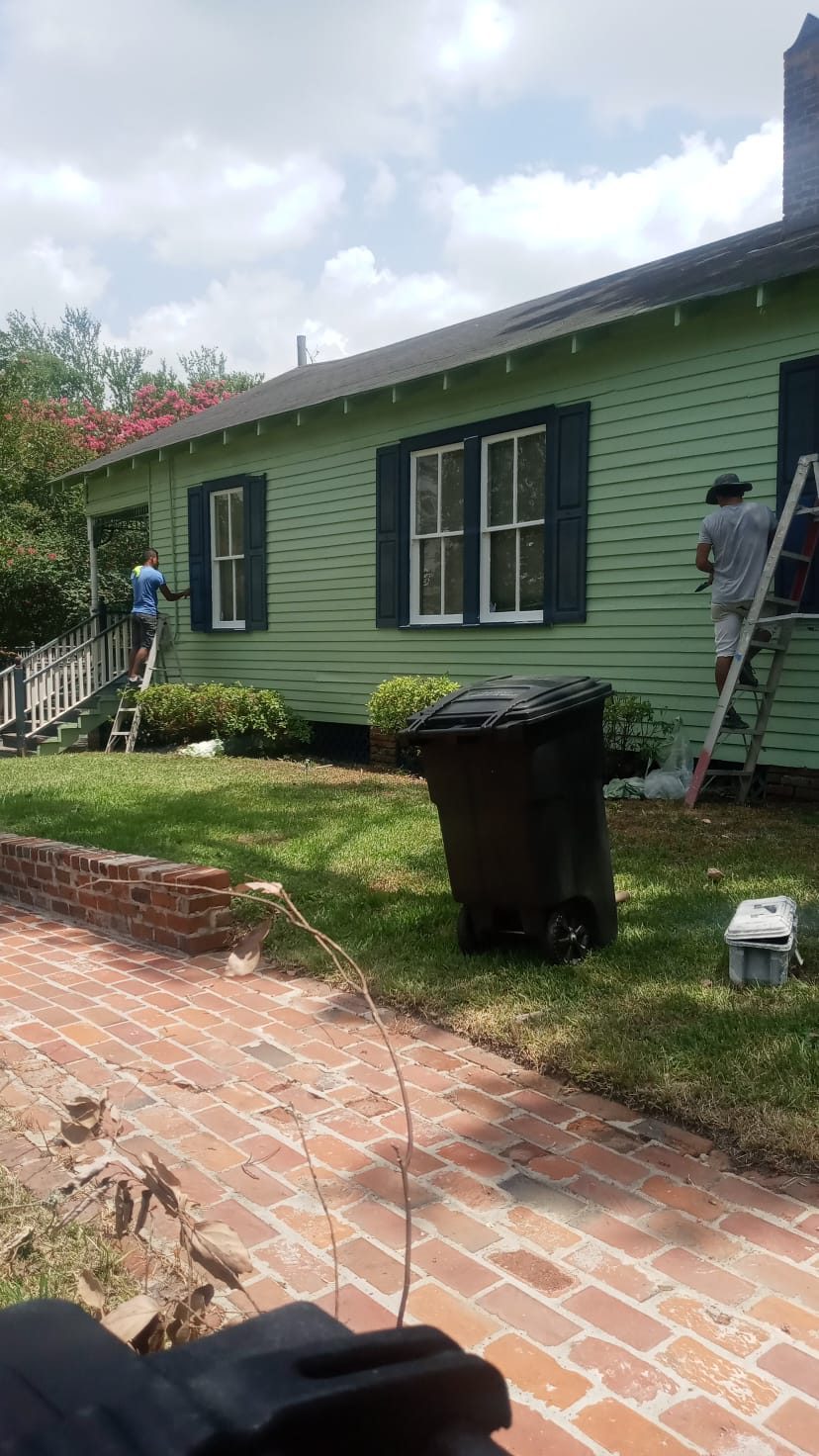 Exterior house painting in progress